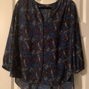 NYDJ navy top with flower/leaf detail. Medium